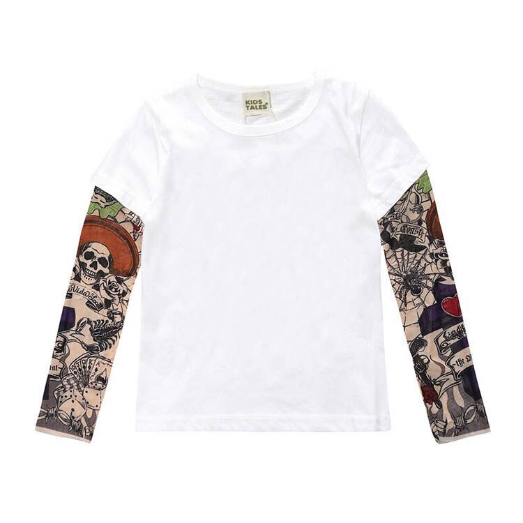 Ancient Energy tattoo boy t-shirt featuring a graphic design of a boy with tattoo-style artwork on the front.
