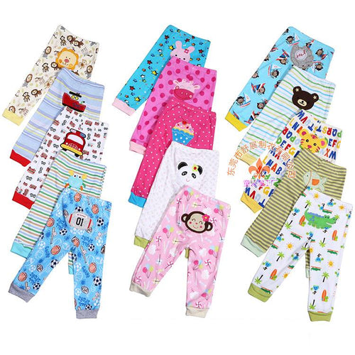 Set of five children's leggings with cartoon print designs by Ancient Energy, featuring colorful and playful patterns.