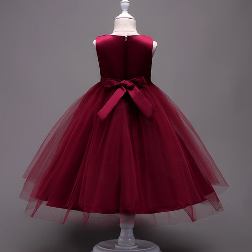 Embroidered kids dress for ages 4 to 15 from Ancient Energy, featuring colorful floral embroidery and a comfortable fit.