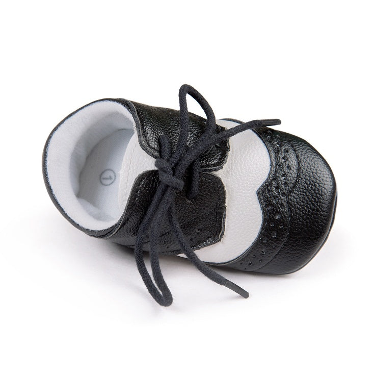 Ancient Energy men's baby shoes with soft soles, ideal for walking and early mobility, featuring a comfortable and flexible design.