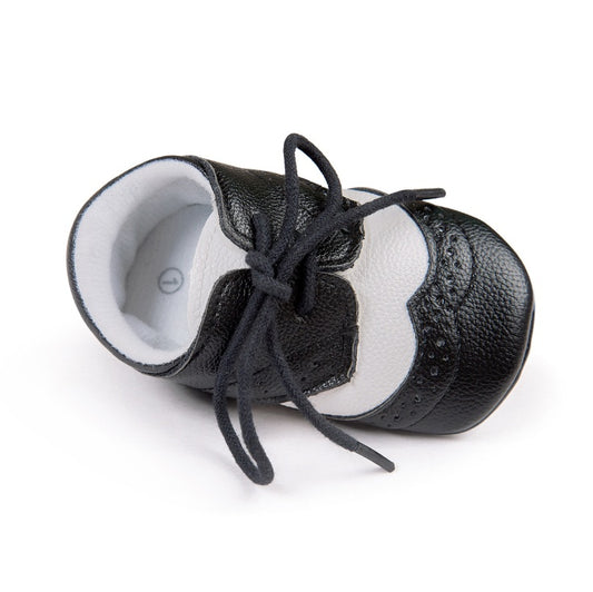 Ancient Energy men's baby shoes with soft soles, ideal for walking and early mobility, featuring a comfortable and flexible design.