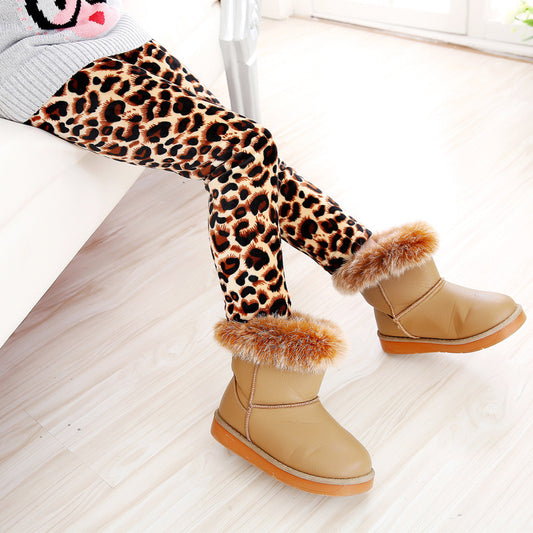 Girls' warm leggings by Ancient Energy in soft, cozy fabric, featuring a comfortable fit and playful design.