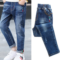 Boys' denim trousers by Ancient Energy, new style big children's pants for spring and autumn, shown on a child.