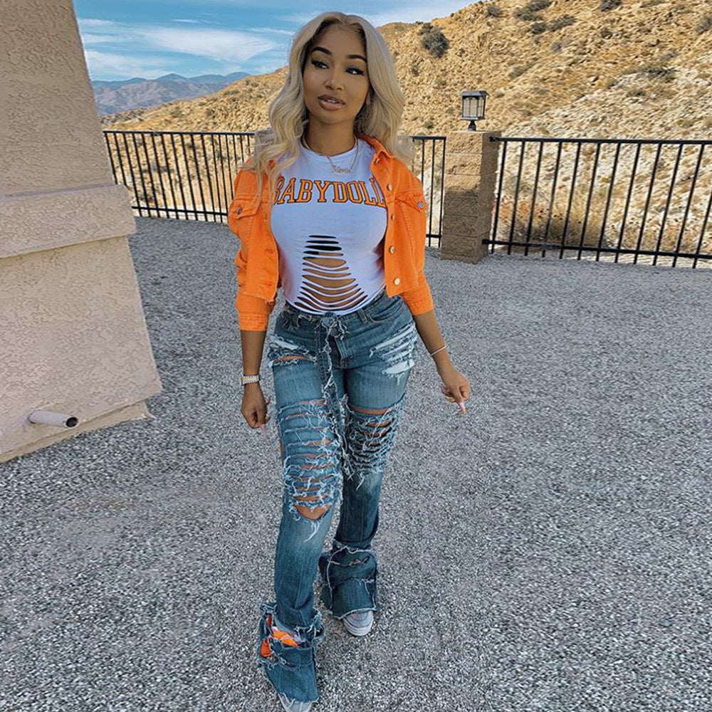 Women’s denim streetwear jacket by Ancient Energy, casual cropped outwear with fitted bodycon style and classic blue jeans look.