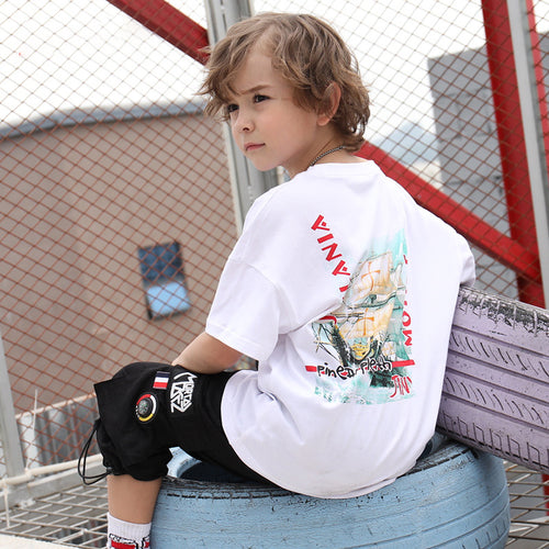Children's printed T-shirt from Ancient Energy featuring colorful graphic design on soft cotton fabric.