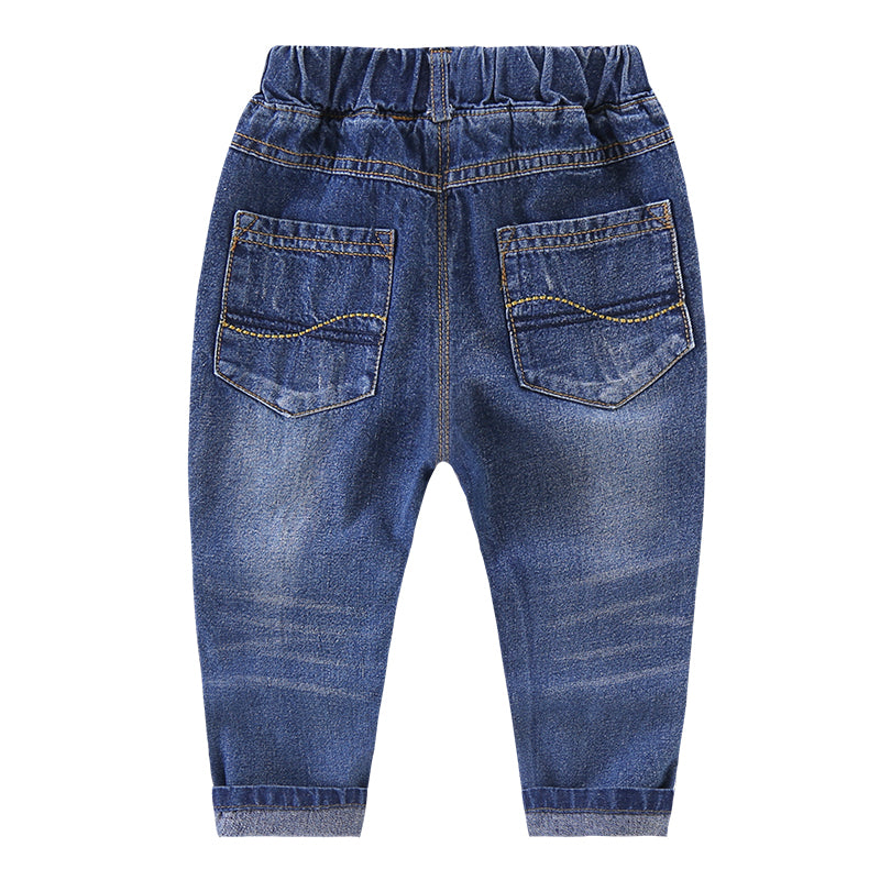 Ripped children's jeans by Ancient Energy showing distressed denim with ripped details and a casual fit.