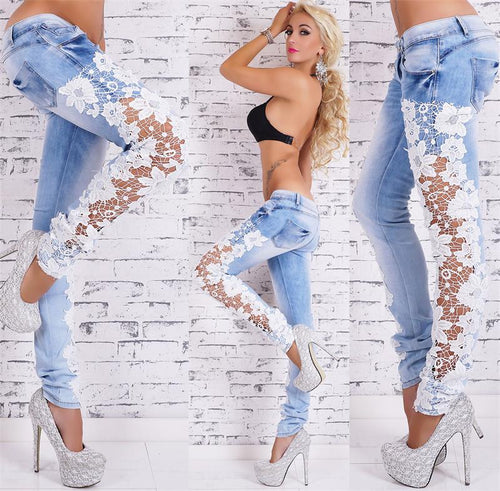 Light blue lace jeans from Ancient Energy featuring intricate lace details and a slim fit design.