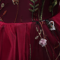 Embroidered kids dress for ages 4-15 by Ancient Energy, featuring colorful floral embroidery and lightweight fabric.