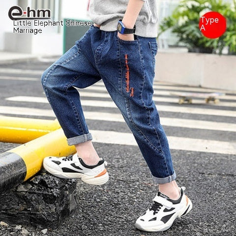Children's boys' denim trousers by Ancient Energy, showing a pair of casual blue denim pants for kids.