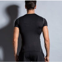 Ancient Energy training tights for sports and fitness, close-up of black, stretchy workout tights designed for active wear.