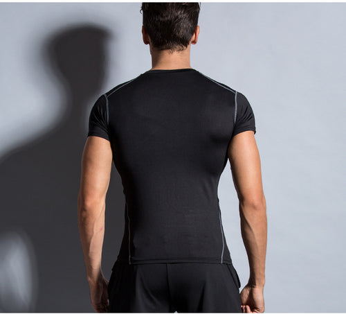 Ancient Energy training tights for sports and fitness, close-up of black, stretchy workout tights designed for active wear.