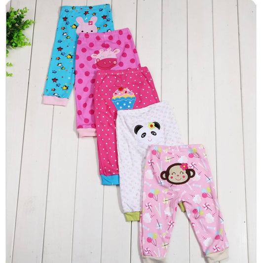 Set of five children's leggings with cartoon prints by Ancient Energy, featuring colorful, playful patterns for kids.