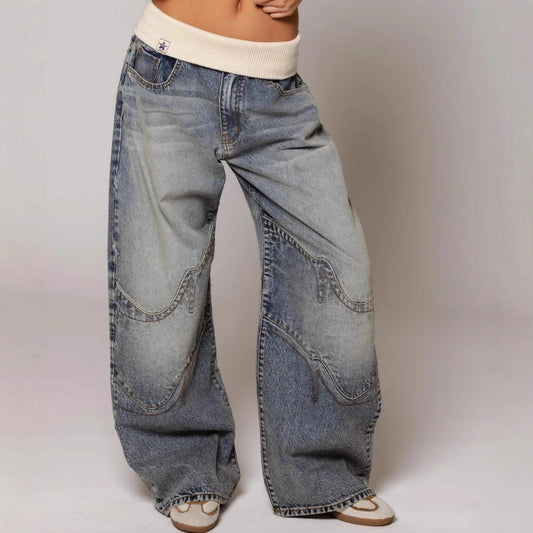 Loose-fitting straight-leg jeans with pockets by Ancient Energy, casual street-style women's trousers in denim fabric.