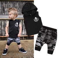 Two-piece toddler boys' sleeveless hooded T-shirt and camo pants outfit by Ancient Energy, featuring casual, comfortable clothing for kids.