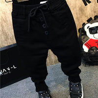 Boy's thickening velvet jeans by Ancient Energy featuring durable denim fabric and a comfortable fit for children.