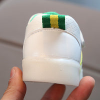 Kimmy White LED Sneakers by Ancient Energy with glowing soles and stylish design, perfect for casual and active wear.