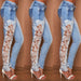 Light blue lace jeans from Ancient Energy with intricate lace detailing and slim fit design.