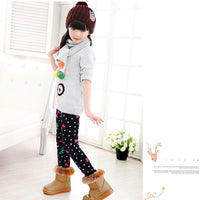 Girls' warm leggings by Ancient Energy, soft and cozy in a vibrant color, perfect for cold weather and active wear.
