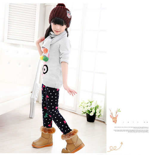 Girls' warm leggings by Ancient Energy, soft and cozy in a vibrant color, perfect for cold weather and active wear.