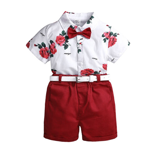 Two-piece summer baby set with floral short sleeve polo shirt and red shorts, suitable for children, by Ancient Energy.