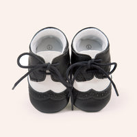 Ancient Energy men's baby shoes with soft soles, ideal for walking and early stages of toddler development.