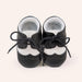 Ancient Energy men's baby shoes with soft soles, ideal for walking and early stages of toddler development.