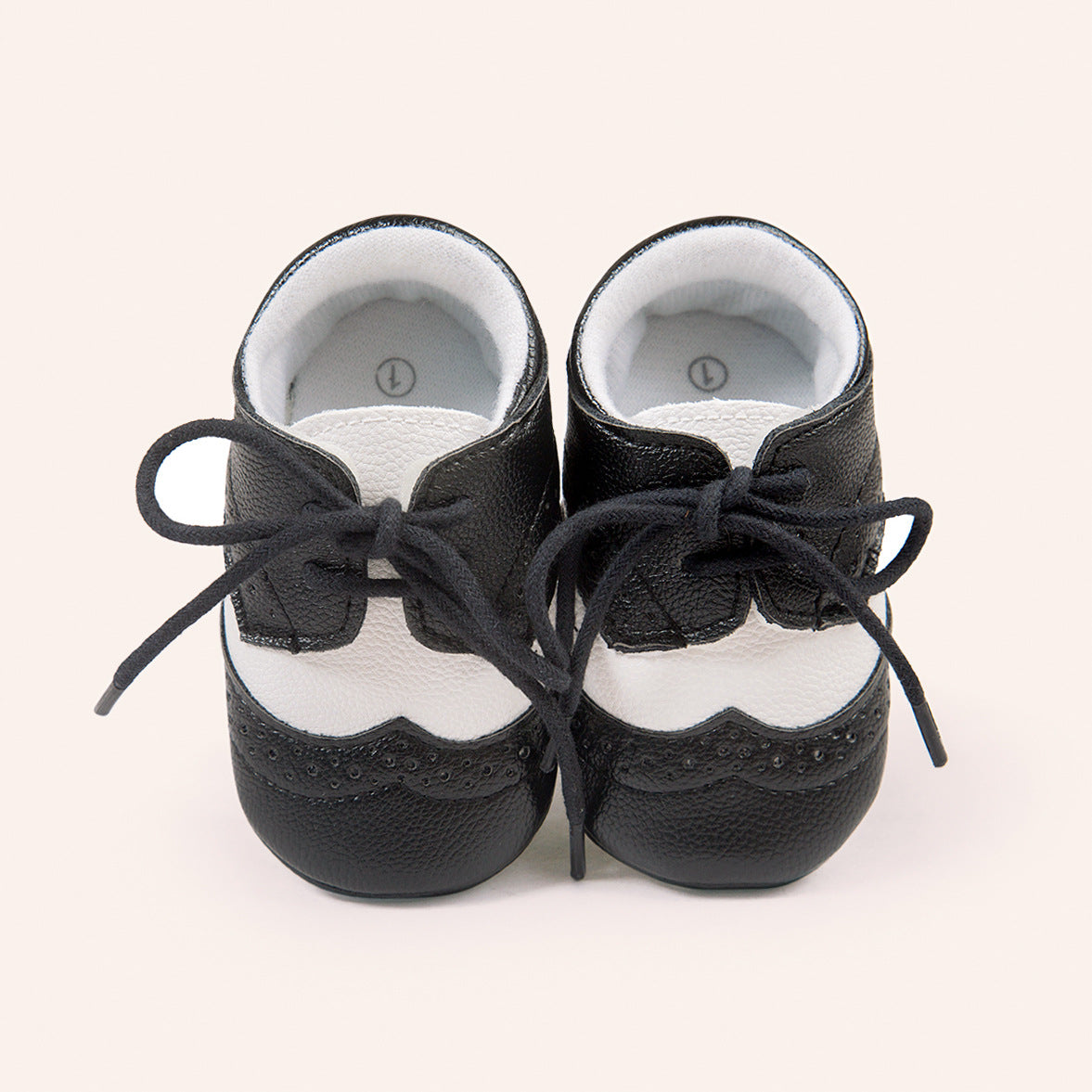 Ancient Energy men's baby shoes with soft soles, ideal for walking and early stages of toddler development.