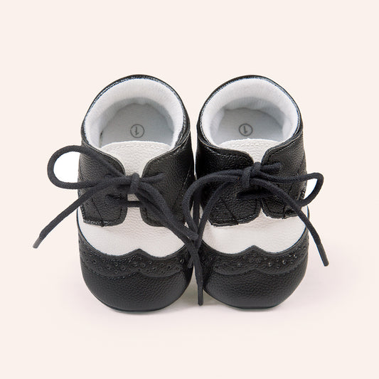 Ancient Energy men's baby shoes with soft soles, ideal for walking and early stages of toddler development.