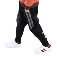 Children's boys' denim trousers from Ancient Energy featuring classic blue denim fabric and a relaxed fit.