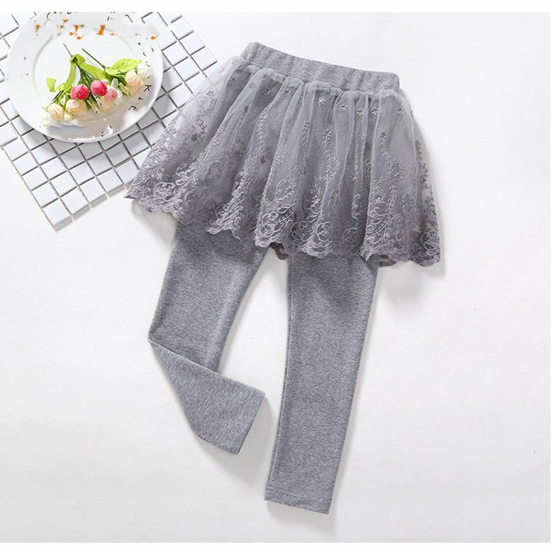 Children's Cotton Leggings with Lace Skirt Design from Ancient Energy, featuring a cute pink and white color scheme and playful style.