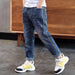 Children's boys' denim trousers by Ancient Energy, featuring classic blue denim with pockets and adjustable waistband.