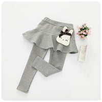 Children's cotton leggings and lace skirt pants set by Ancient Energy, featuring pink and white fabric with playful design details.