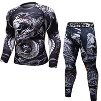 Ancient Energy MMA workout compression rashguard T-shirt in black with logo, designed for training and athletic performance.