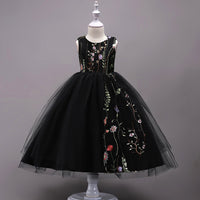 Embroidered kids dress for ages 4 to 15 by Ancient Energy, featuring colorful floral embroidery and a comfortable fit.