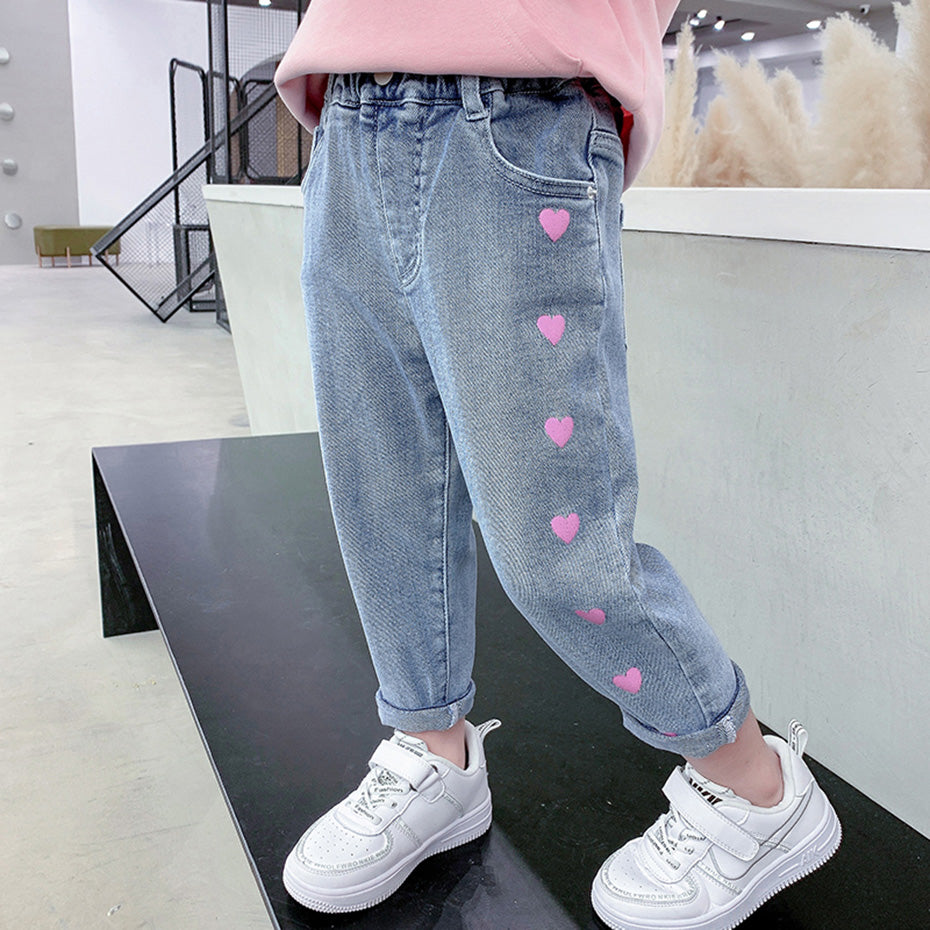 Girls' casual thin love stretch jeans by Ancient Energy, featuring a comfortable fit and stylish design, shown on a girl.