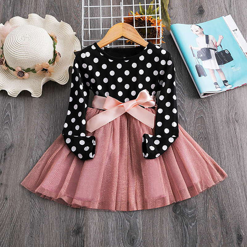 Polka dot princess dress for girls by Ancient Energy, featuring a playful design with ruffles and a bow on the front.