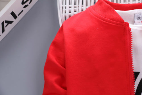 Children's three-piece clothing set by Ancient Energy, featuring colorful tops and pants for kids, displayed on a white background.