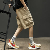 Men's cargo shorts with multiple pockets, summer casual pants by Ancient Energy, lightweight and comfortable for warm weather.