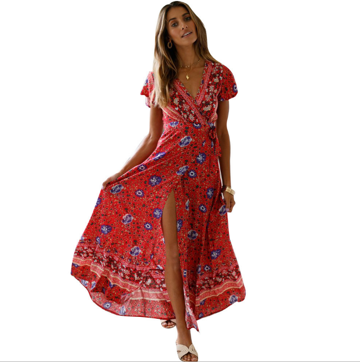 Mandotos International Tropical Bloom Maxi Dress with vibrant floral pattern and flowing fabric, perfect for summer wear.