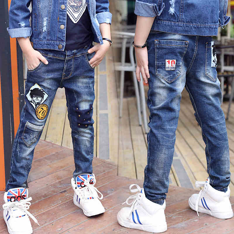 Boy wearing Ancient Energy velvet one-piece jeans for autumn and winter, featuring a cozy, stylish denim design.