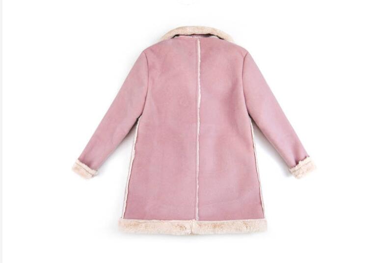 Children's winter clothing set by Ancient Energy featuring a warm jacket, hat, and mittens for cold weather.