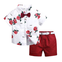 Two-piece summer baby set with floral short sleeve polo shirt and red shorts, perfect for children's school wear.
