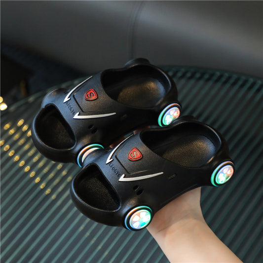 Kids glowing cartoon car slippers from Ancient Energy, luminous summer beach sandals with anti-slip soles for boys and girls.