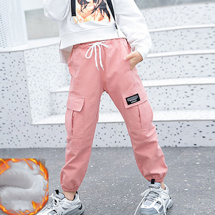 Teenager middle school girl wearing black workwear leggings from Ancient Energy, suitable for elementary school students.