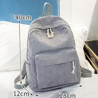 Ancient Energy corduroy backpack for students with shoulder straps, suitable for school and casual use.