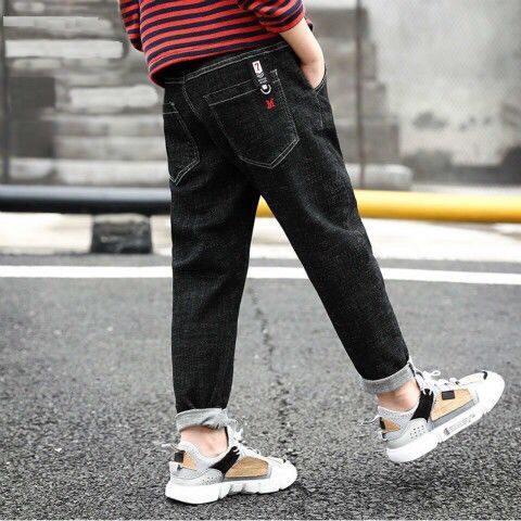 Children's denim trousers by Ancient Energy, boys' casual denim pants with classic blue wash and adjustable waist for kids.