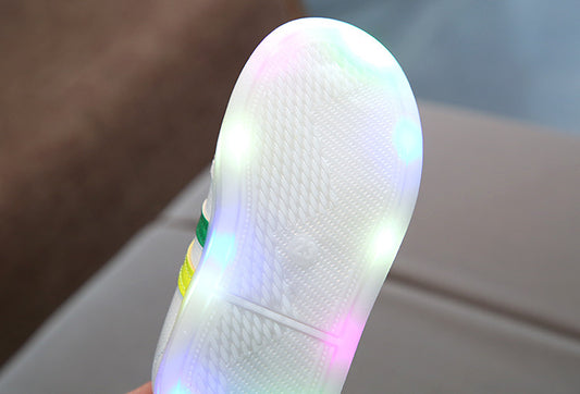 White LED sneakers from Ancient Energy featuring stylish design and illuminated soles, perfect for casual and trendy looks.