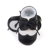 Ancient Energy boys' soft sole baby shoes, ideal for new walkers, featuring comfortable design and flexible sole.