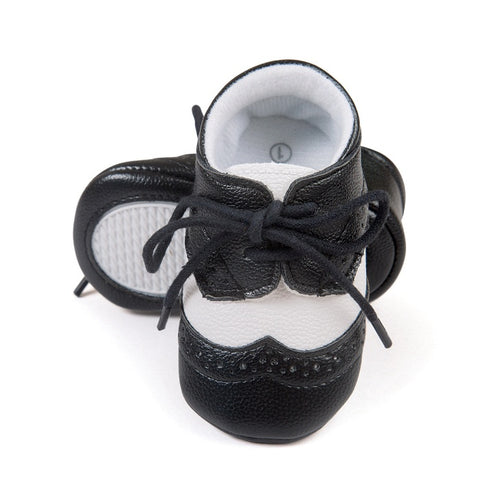 Ancient Energy boys' soft sole baby shoes, ideal for new walkers, featuring comfortable design and flexible sole.