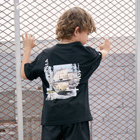 Children's printed T-shirt by Ancient Energy featuring colorful graphic design and comfortable cotton fabric.
